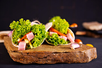 Wall Mural - Fresh tortilla wraps with ham cheese and vegetables