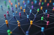 © Sergio - Colorful network of pins connected by lines on a dark background representing a digital communication system