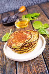 Wall Mural - Spinach pancakes with fresh herbs