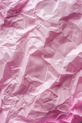 Poster - Pink crumpled paper texture background with soft focus. Close-up view of folded pink paper with rough surface and curled edges. Perfect for design projects, print materials, or digital displays.