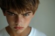 © AIGen - Angry Teenage Boy. Caucasian Teenage Boy with Troubled Gaze