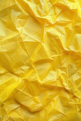 Poster - Yellow crumpled paper texture background with uneven surface. Close-up view of folded and creased yellow poster material. Perfect for graphic design, digital art, or advertising purposes.