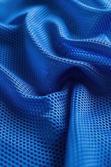 Aufkleber - Blue fabric grid pattern close-up texture football jersey sports clothing. Vibrant blue color with white grid lines create striking visual effect. Elevated angle shows fabric details.
