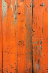 Poster - Old weathered wooden planks with orange hue, rough texture and small holes. Close-up view of rustic wood surface, blurred background emphasizes texture and color.