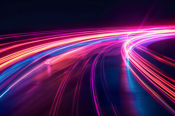 A long, curving road with bright pink and blue lights,