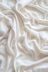 Aufkleber - Close-up view of white fabric with smooth texture possibly made from cotton or linen. Fabric has slightly curled edges and blurred background drawing focus to its surface.