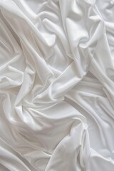 Poster - Close-up view of white fabric possibly sheet blanket crumpled, folded creating sense depth dimensionality. Fabric texture smooth with interesting folds. Gray background contrasts with white fabric.