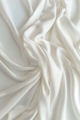Poster - Close-up view of white fabric possibly sheet curtain folded in half revealing intricate texture, shadow on surface background blurred, drawing focus to central subject fabric smooth surface