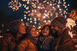 © Alexandra - Happy family watching fireworks display celebrating new year's eve together