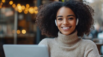 Poster - Beautiful smiling young mixed race woman in turtleneck and with curly hair sitting in cafe and having video call over laptop In ears are earphones Picture taken from outside : Generative AI