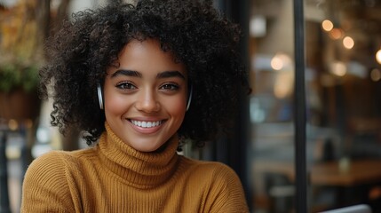 Poster - Beautiful smiling young mixed race woman in turtleneck and with curly hair sitting in cafe and having video call over laptop In ears are earphones Picture taken from outside : Generative AI