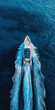 © blinkstud.io - Aerial drone ultra wide top down photo with copy space of luxury rigid inflatable speed boat cruising in high speed in Aegean deep blue sea, Greece
