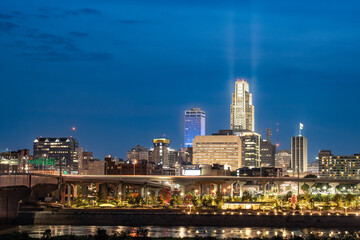 Night view of Omaha Nebraska skyline with illuminated buildings