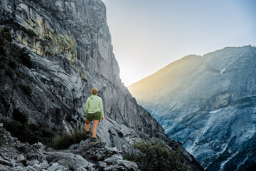 Sticker - Woman Stands on Snow Creek Trail with Golden Light