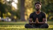 © DigitalMagicVisions - Serene Mixed-Race Man Embracing Mental Wellness: Mindfulness Meditation in Diverse Nature Setting Encouraging Mental Health Recovery