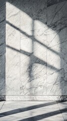 Wall Mural - Sunlight casting geometric shadows on marble wall in modern building