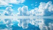 © Veayo - A serene scene of fluffy white clouds floating over a calm blue ocean, reflecting in the water below.