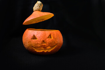 Halloween pumpkin jack on black background