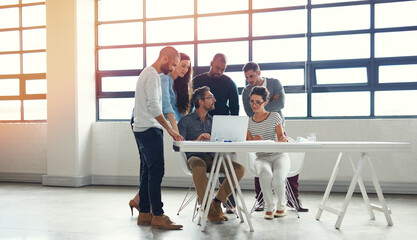 Fototapete - Collaboration, design and laptop with business people in office together for conversation or creative discussion. Computer, planning or web development with man and woman employee team in workplace