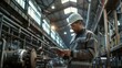 © MP Studio - The Worker with Tablet in Factory