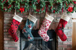 © Petr - Four Christmas stockings hanging on a brick fireplace with bright red wreaths and mistletoe adding charm to the festive decor.. AI generated.