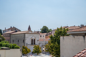 Wall Mural - Streets, alleys and buildings of a historic Mediterranean old town on the Mediterranean Sea. A sunny day in the coastal town with a port on the Adriatic Sea, Zadar, Dalmatia, Croatia