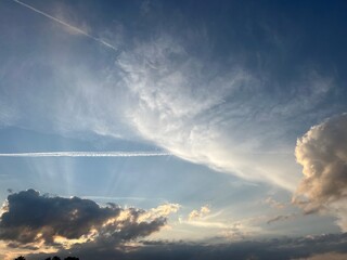 Fantastic sky background, sunlight in the sky, cloudscape and heavens background