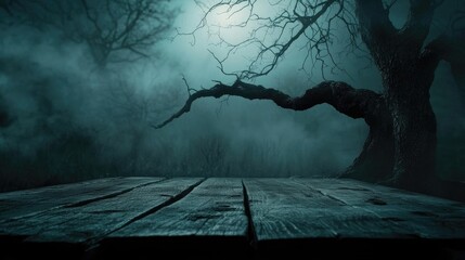 Wall Mural - Old wood table and silhouette dead tree at night for Halloween background