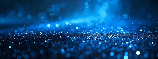 Glowing Blue Abstract Background with Bokeh Light Effect