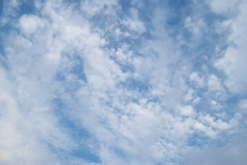 Wall Mural - gentle white clouds in the blue sky