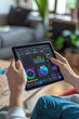 © spyrakot - Family Using Smart Home App on Tablet to Monitor and Adjust Energy Consumption Settings