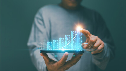 Poster - Business data analysis and project management concept, Man holding smartphone and pointing to analyze financial graph for investment, Corporate future growth plan, Business planning and strategy.