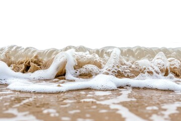 Wall Mural - A close-up view of a wave crashing on the beach, with water and sand in focus