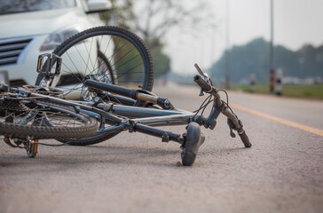 Accident car crash with bicycle on road because drunk driving.