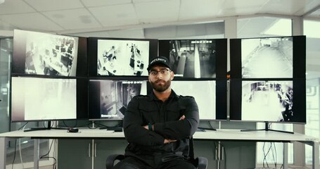 Poster - Security, monitor and face of man with arms crossed for surveillance, job and safety service. Serious, operator and confident with tech in control room for camera, footage and protection of building