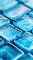 Poster - Textured blue glass tiles showcase a stunning array of colors and reflections, revealing intricate patterns and shimmering surfaces
