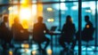 © 69 - A modern meeting room with blurred silhouettes of businesspeople in the background, focusing on the atmosphere of collaboration.