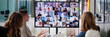© Andrey Popov - Group Of Businesspeople Having Video Conference