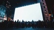 © Astock Media - Silhouettes of People Gathering in Front of a Large Blank Billboard in a City