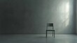 © Hansa & Party - A chair is the only piece of furniture in a barren, gray room, creating an overwhelming feeling of loneliness