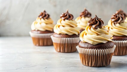Poster - Cupcakes topped with creamy glaze and chocolate on a light background