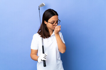 Wall Mural - Young golfer woman over isolated colorful background having doubts