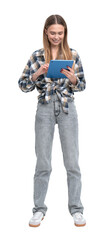 A woman in a casual plaid shirt and jeans is standing and using a tablet. The image is isolated on a white background. Technology and lifestyle concept