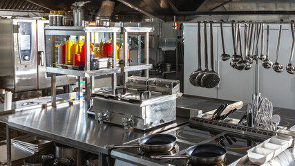 modern restaurant kitchen with professional equipment. concept of highend culinary space