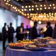 © PuiZera - Food on a table at a corporate event with blurry background.