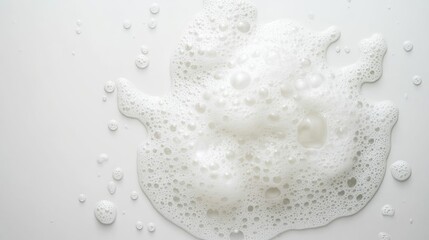 Canvas Print - A white foam with bubbles on a white background