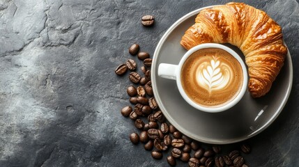 Coffee & croissant on stone