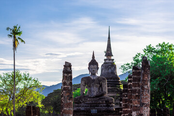 The natural background of the evening twilight, the colorful sky inside Sukhothai Historical Park, a tourist attraction that Europeans always visit.