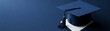 © Keattipoom - Graduation Cap on White Paper Against Navy Background, Symbolizing Academic Achievement and Success in Education