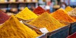 © Kamonwan - Vibrant spices in small containers create a colorful display in a bustling market, showcasing the diversity of flavors.
